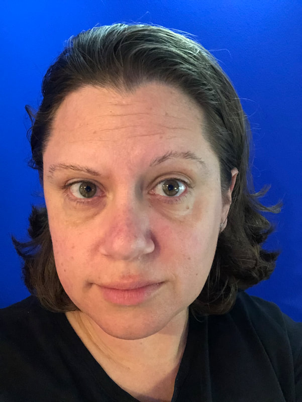 Female, caucasian, shoulder length wavy hair and eyes both brown.  A bit overweight “stocky” 5’8” body. Posed behind chroma blue background drop